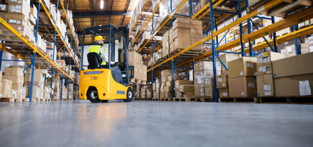 Man on forklift in a warehouse
