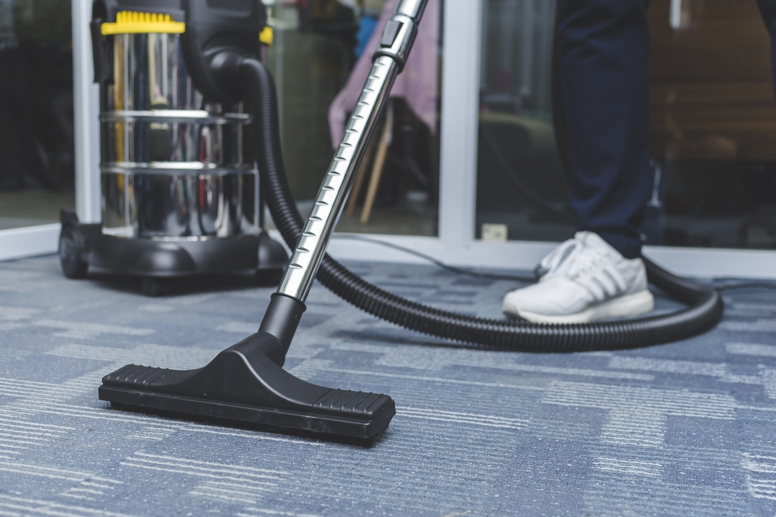 vacuuming floor