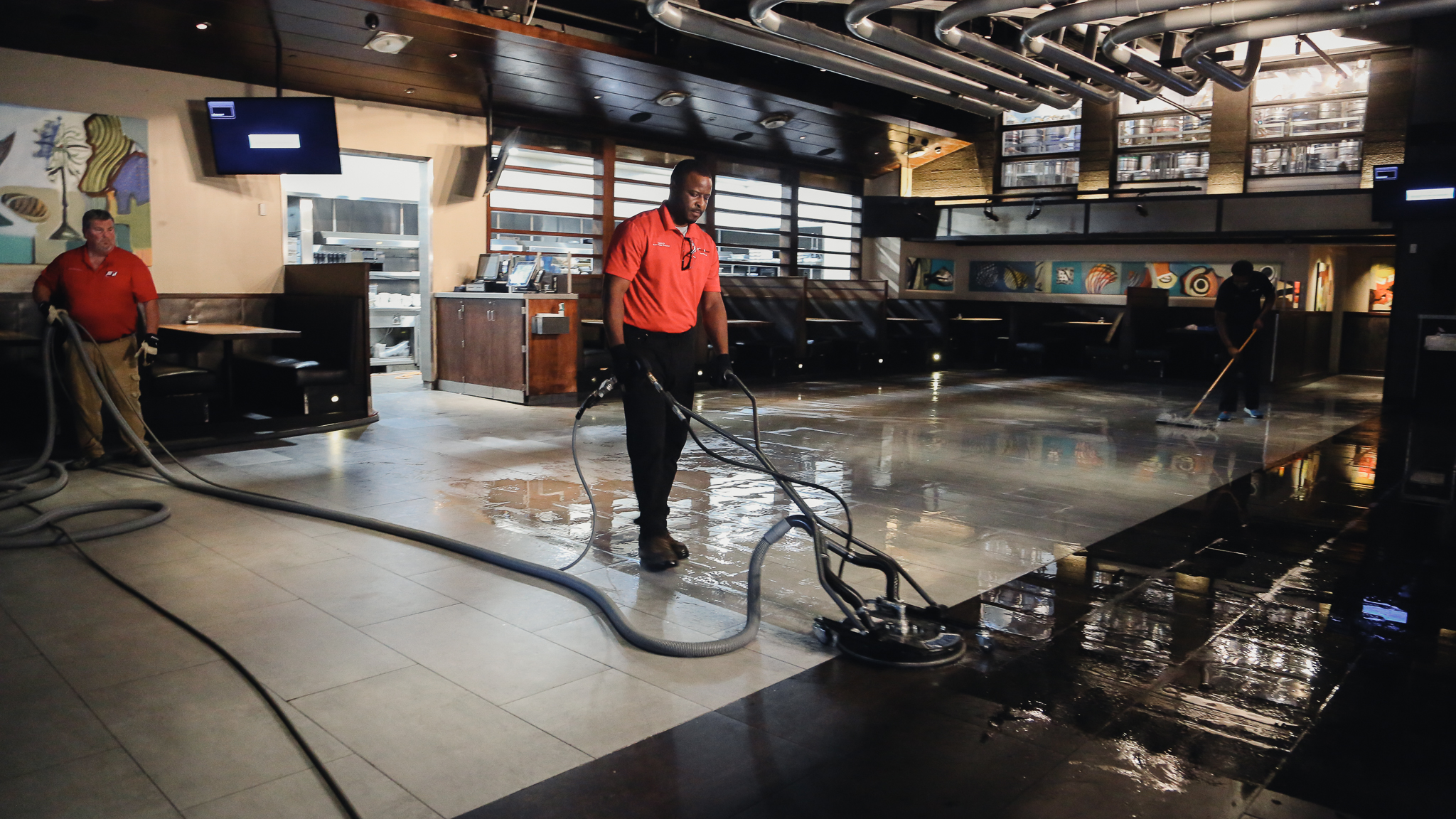 professionals cleaning floor