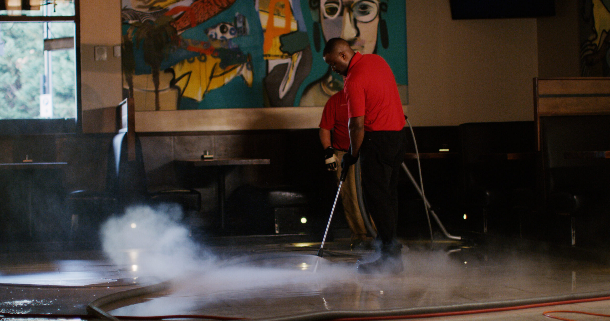 professionals cleaning a floor